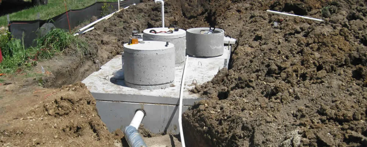 Septic system repair and installation site with tank access ports in San Jose, CA
